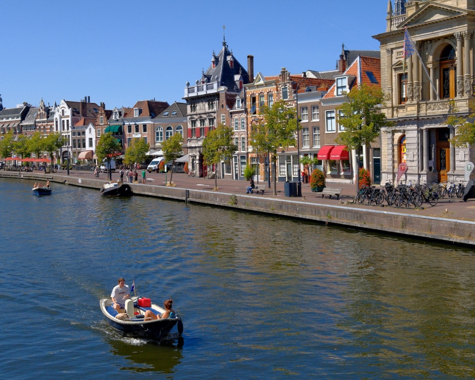 A small boat crossing the Spaarne in central Haarlem